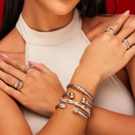 Bracelete Rodio com Esferas Douradas nas Pontas
