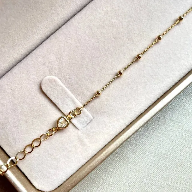 Pulseira Bolinhas com Coração Cristal