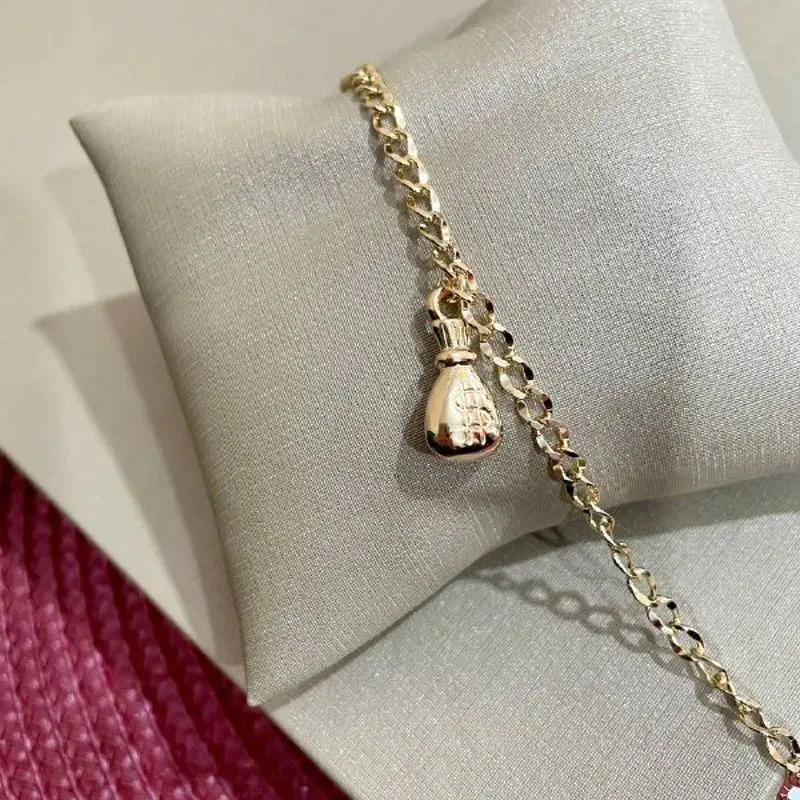 Pulseira Clássica com Saco de Dinheiro