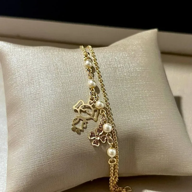 Pulseira Dupla Pérolas com Menina e Trevo
