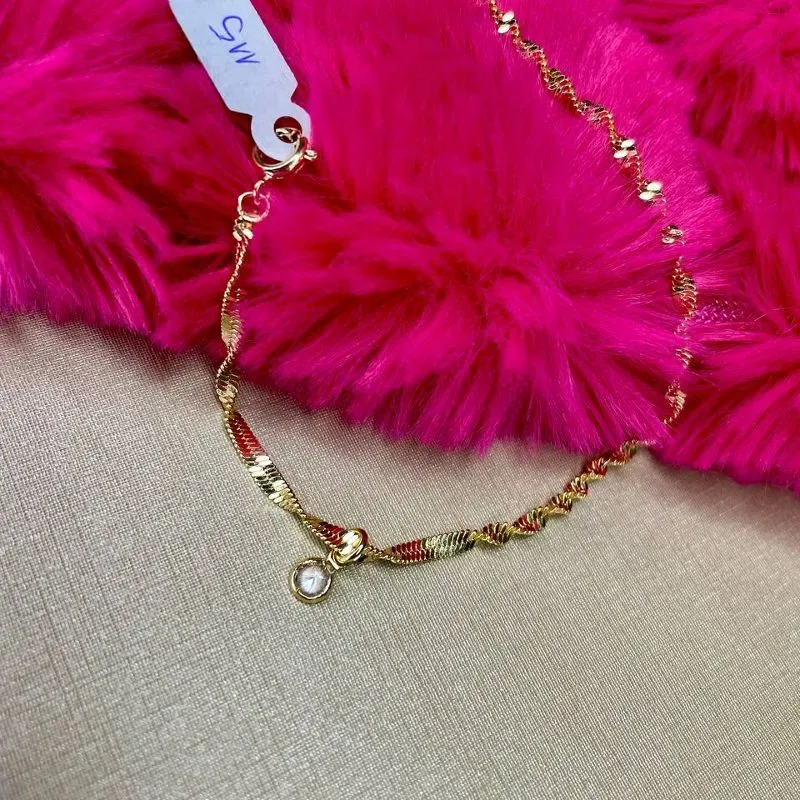 Pulseira Fita Torcida com Ponto de Luz