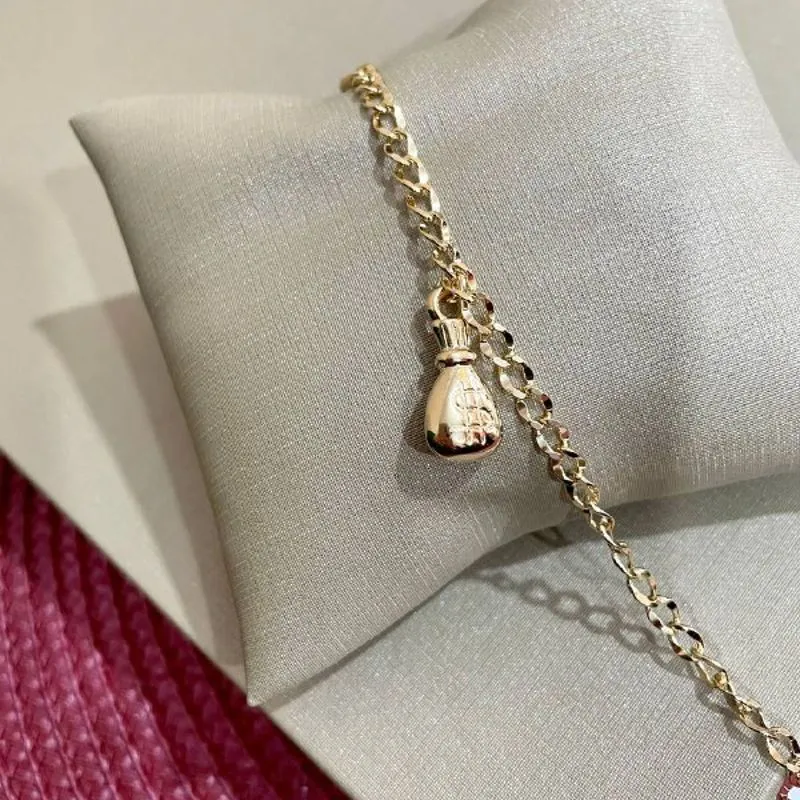 Pulseira Clássica com Saco de Dinheiro