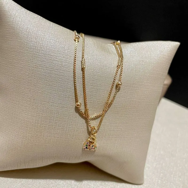 Pulseira Dupla com Bolsa Crav
