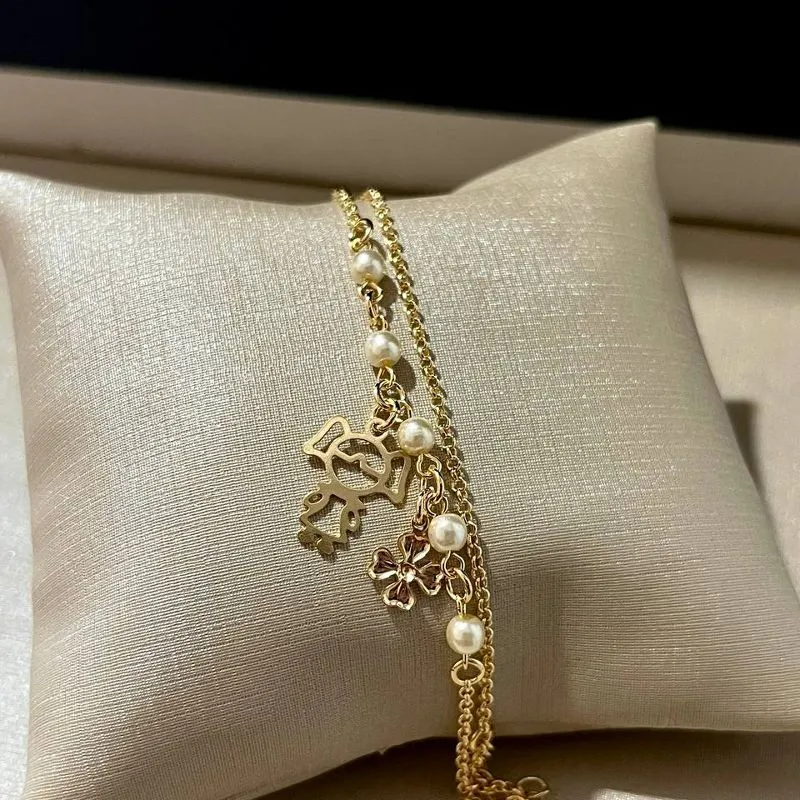 Pulseira Dupla Pérolas com Menina e Trevo