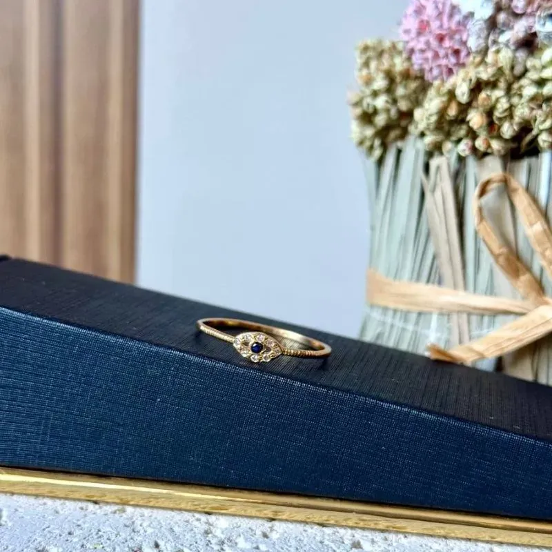 Anel Olho Grego - zirconia azul no meio